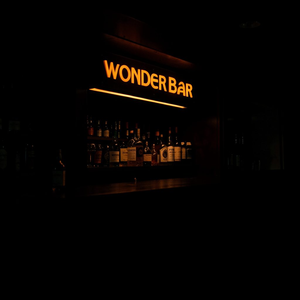 Wonder chocolate bar with elegant embossed detailing in warm cocoa and gold tones